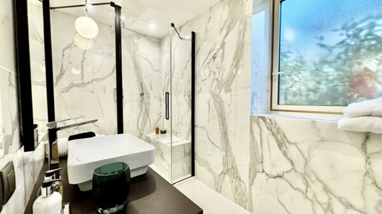 Un appartement rénové dans le quartier Saint Roman - 13 / 16